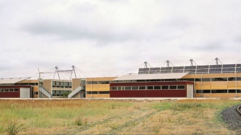 The factory buildings of Solvis GmbH from a distance.