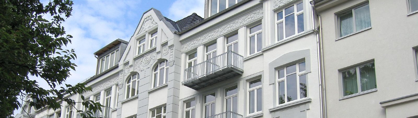 View of the facade after the renovation of both halves of the house