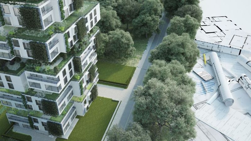 Green building next to project plans